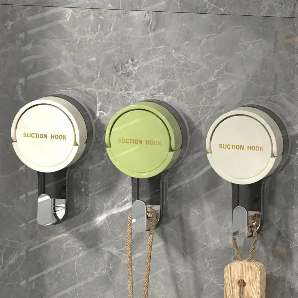 Reusable waterproof suction wall hooks by ja1a2e-ff, heavy-duty design, two pieces, clear suction cups on a tiled surface.